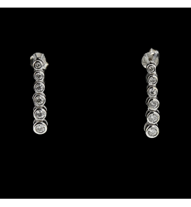 Boucles d'oreilles or gris pendantes diamants