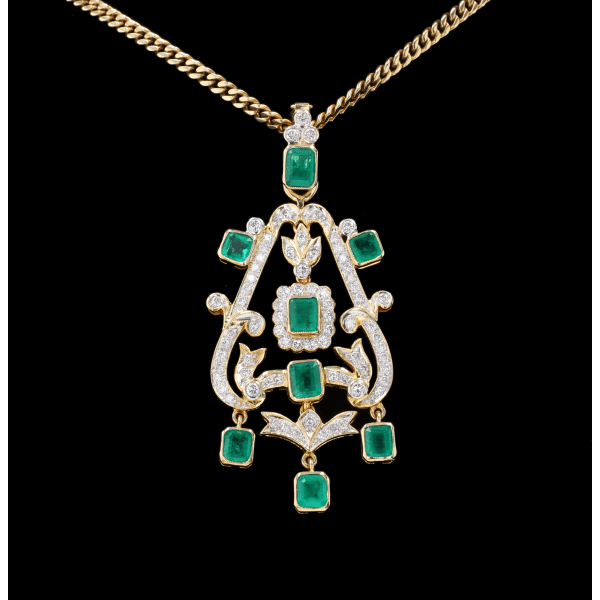 Necklace yellow gold emeralds and diamonds.