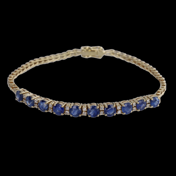 Sapphire and diamond bracelet in yellow gold.