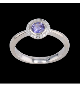 Ring aus Graugold mit blauem Kunststein und Diamanten
