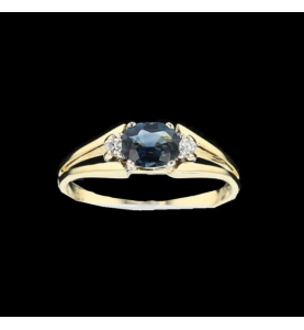 Yellow gold sapphire ring and diamonds