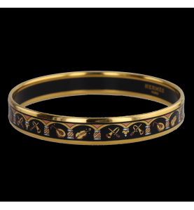 Bracelet Hermès en émail noir et plaqué or.
